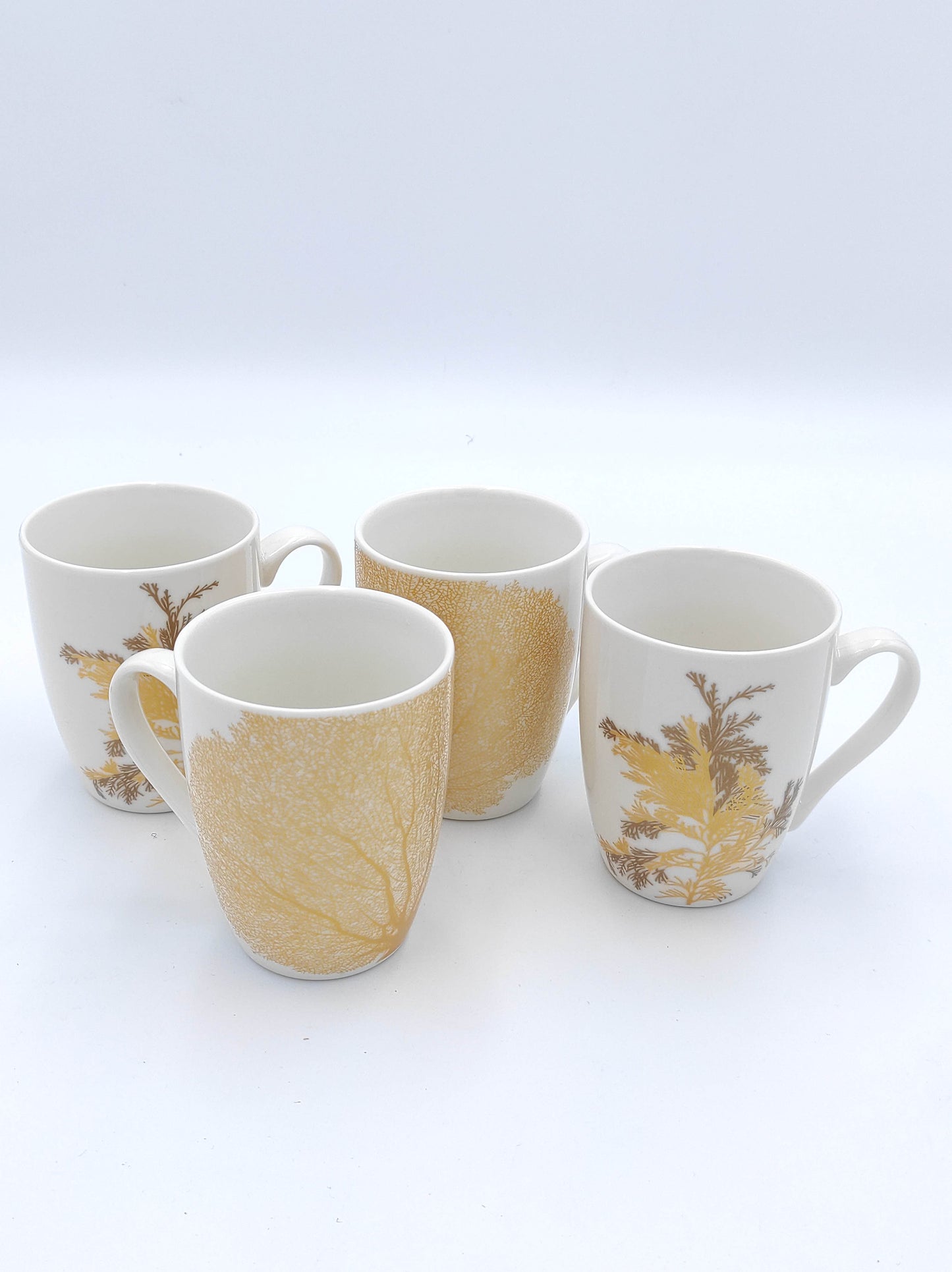 WD Lifestyle New Bone China Juego de 4 platos y 4 tazas en cerámica y acabado dorado