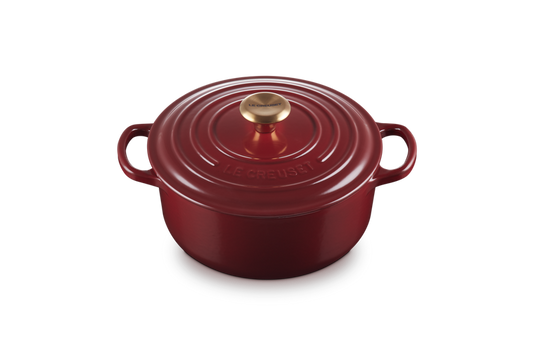 Cocotte rotonda Evolution 20 cm in ghisa vetrificata  pomolo oro Le Creuset